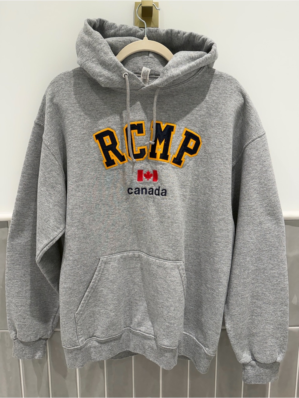 Gray RCMP Canada Hoodie with Yellow Lettering